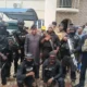 Sunday Igboho in black native attire flanked by members of his Iru Ekun Security team during the lau