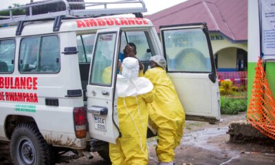 congolese health workers receive patient 1094463503