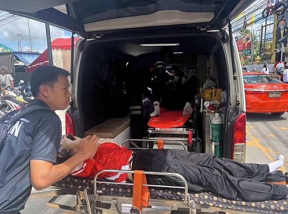 People being treated after a shooting in Thailand People being treated after a shooting in Thailand
