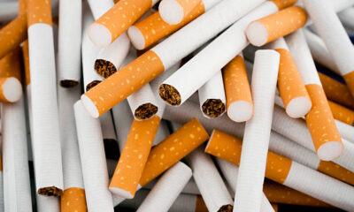 cigarettes randomly piled in a large heap