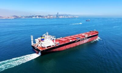 A drone photo taken on April 13 2026 shows a green fuel vessel setting sail for sea trials in Jiaozh