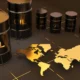 oil barrels on black background with golden world map 1788974522