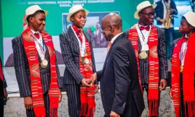 Governor Otti in a group photography with the students