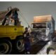 Two injured as two container trucks three vehicles crash in Lagos